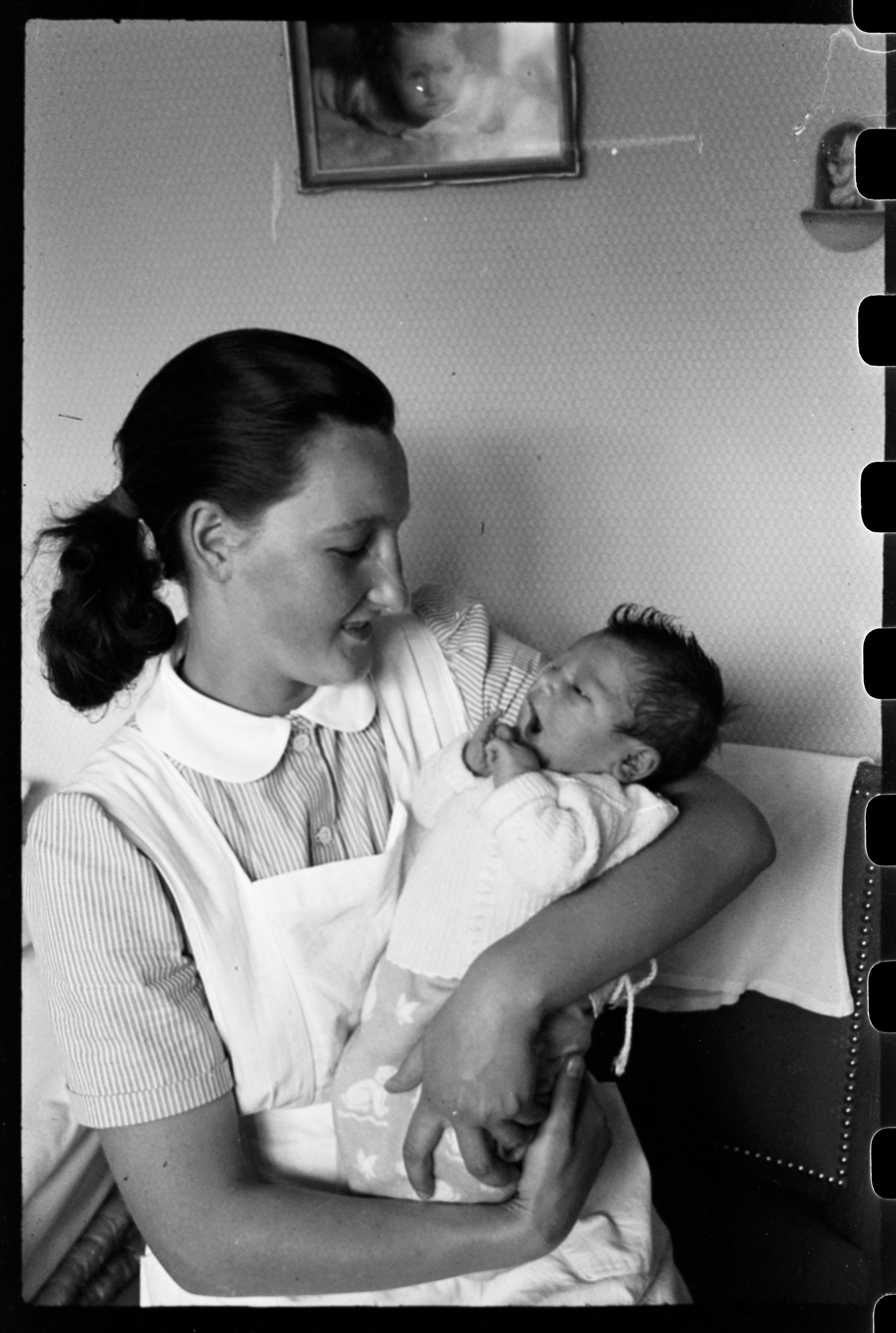 Midwife with newborn