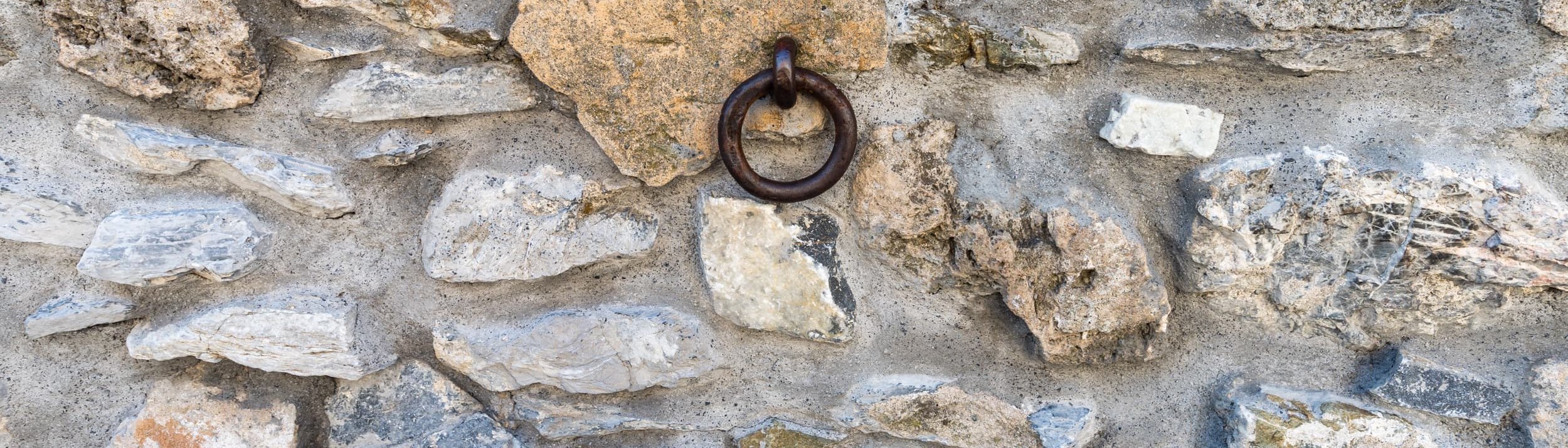 Metal ring in stone wall